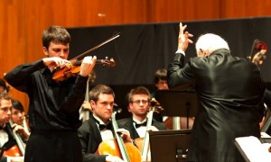 Queens violin student violin player and orchestra