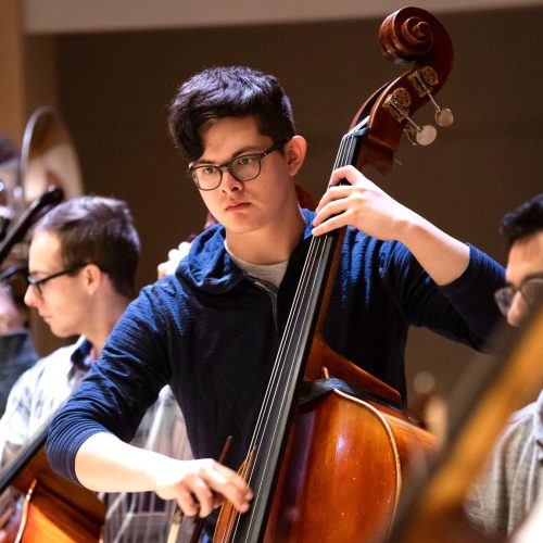 Students perform during an Orchestra rehearsal.