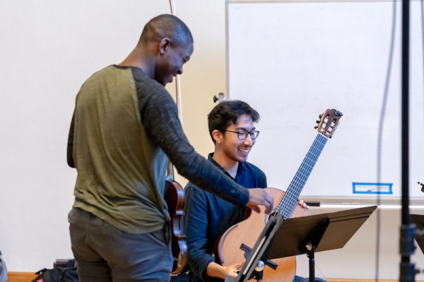 members of the Phillip Glass band hold a master Class for students