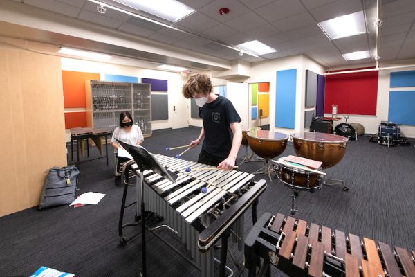 Yuri Inoo, Percussion & Drumline Instructor, works with Noah Smith '25 in the new Music Department Percussion Studio in Thorne Hall on Nov. 17, 2021.
(Photo by Marc Campos, Occidental College Photographer)